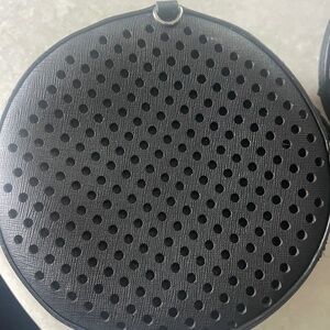 Rebecca Minkoff black circle bag with crossbody strap and wristlet studded